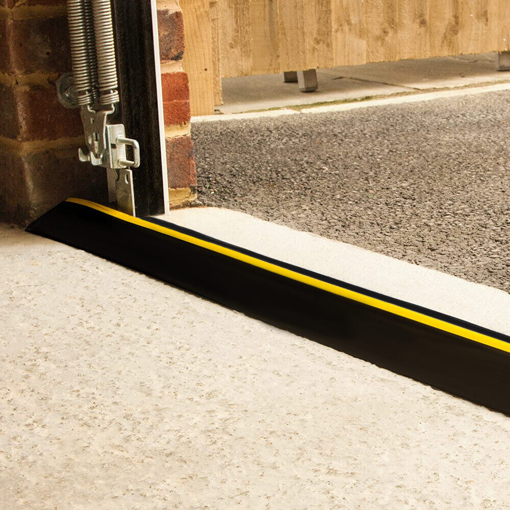 Threshold seal fitted under a garage door